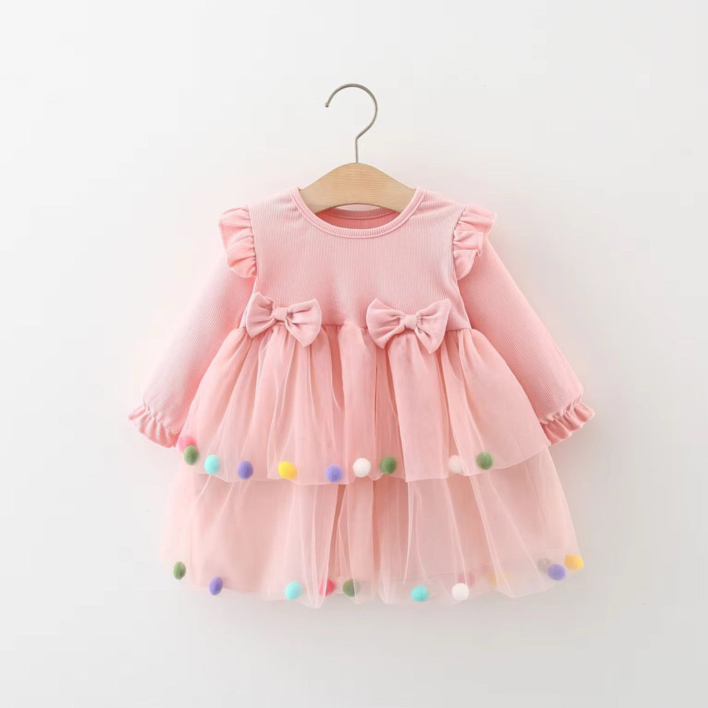 Rosa Tüllkleid für Mädchen mit Schleifen und Pompons – Festlich & Verspielt